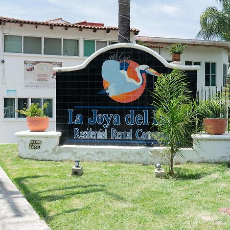 Capital O La Joya Del Lago Ахихик Екстер'єр фото